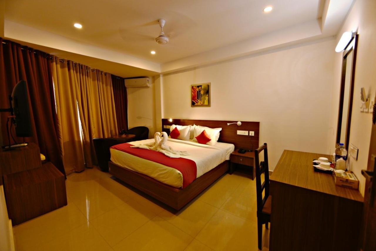 Hotel Nithya Kottayam Bagian luar foto