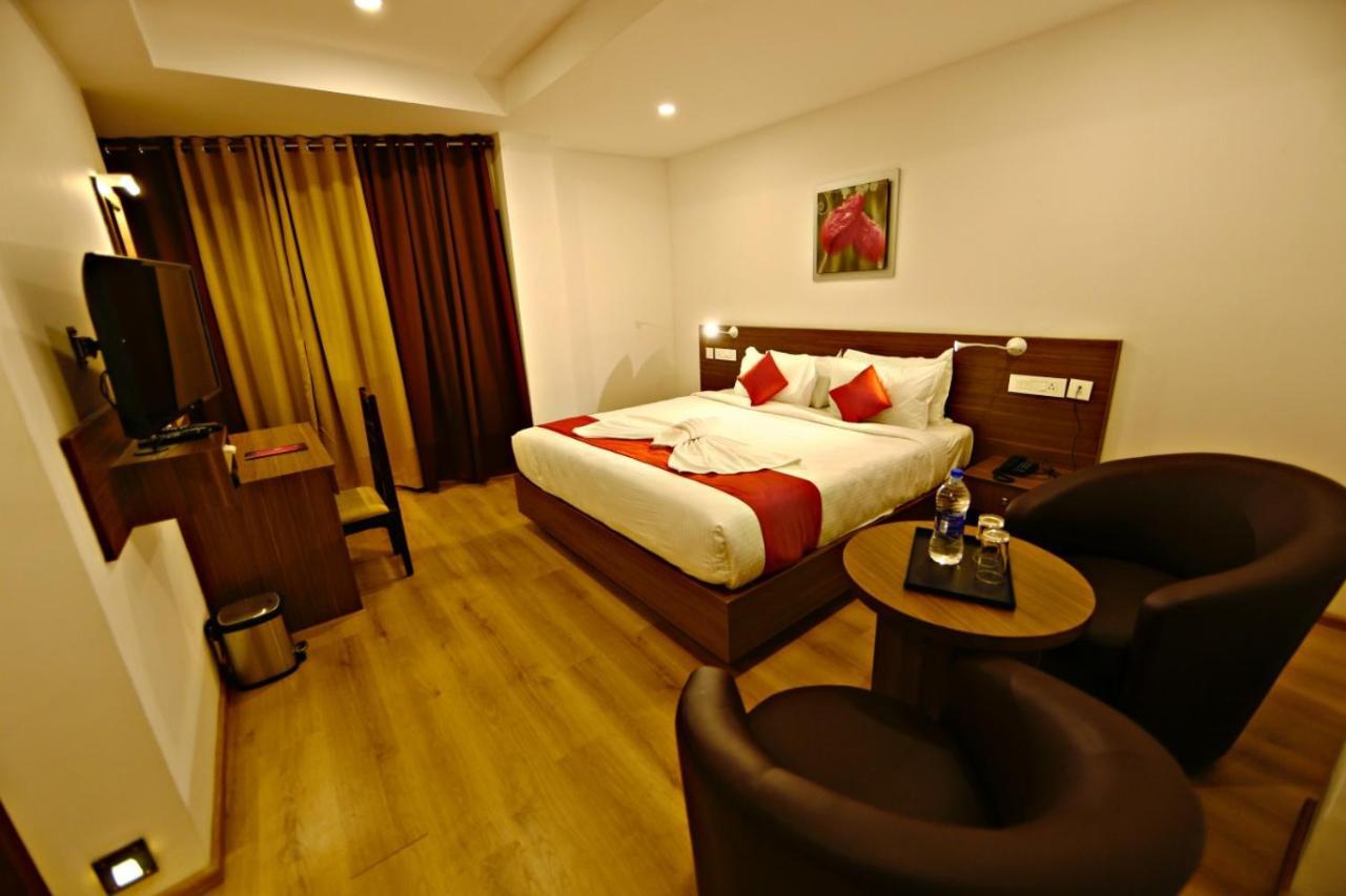 Hotel Nithya Kottayam Bagian luar foto
